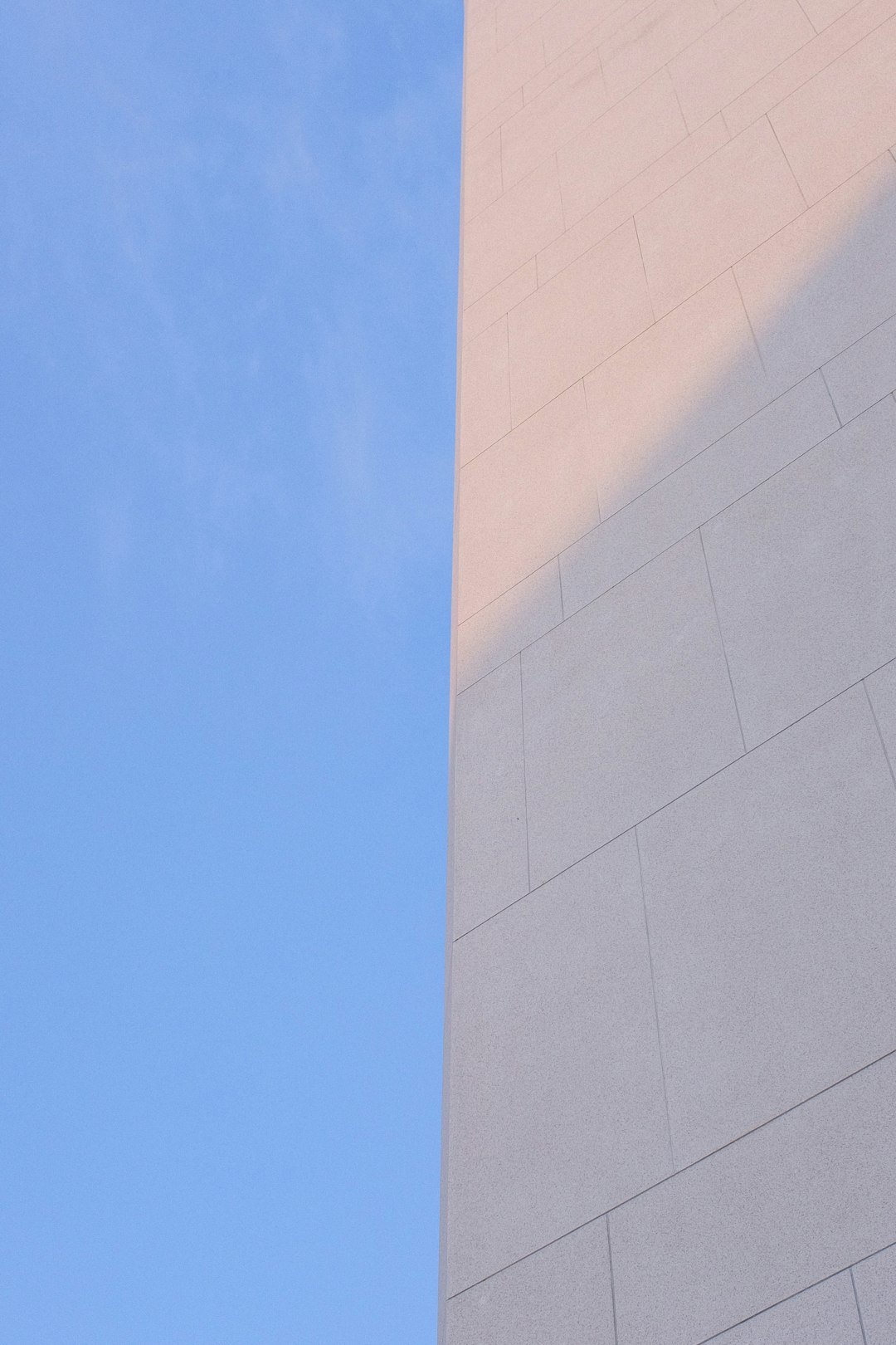 white concrete building under blue sky during daytime