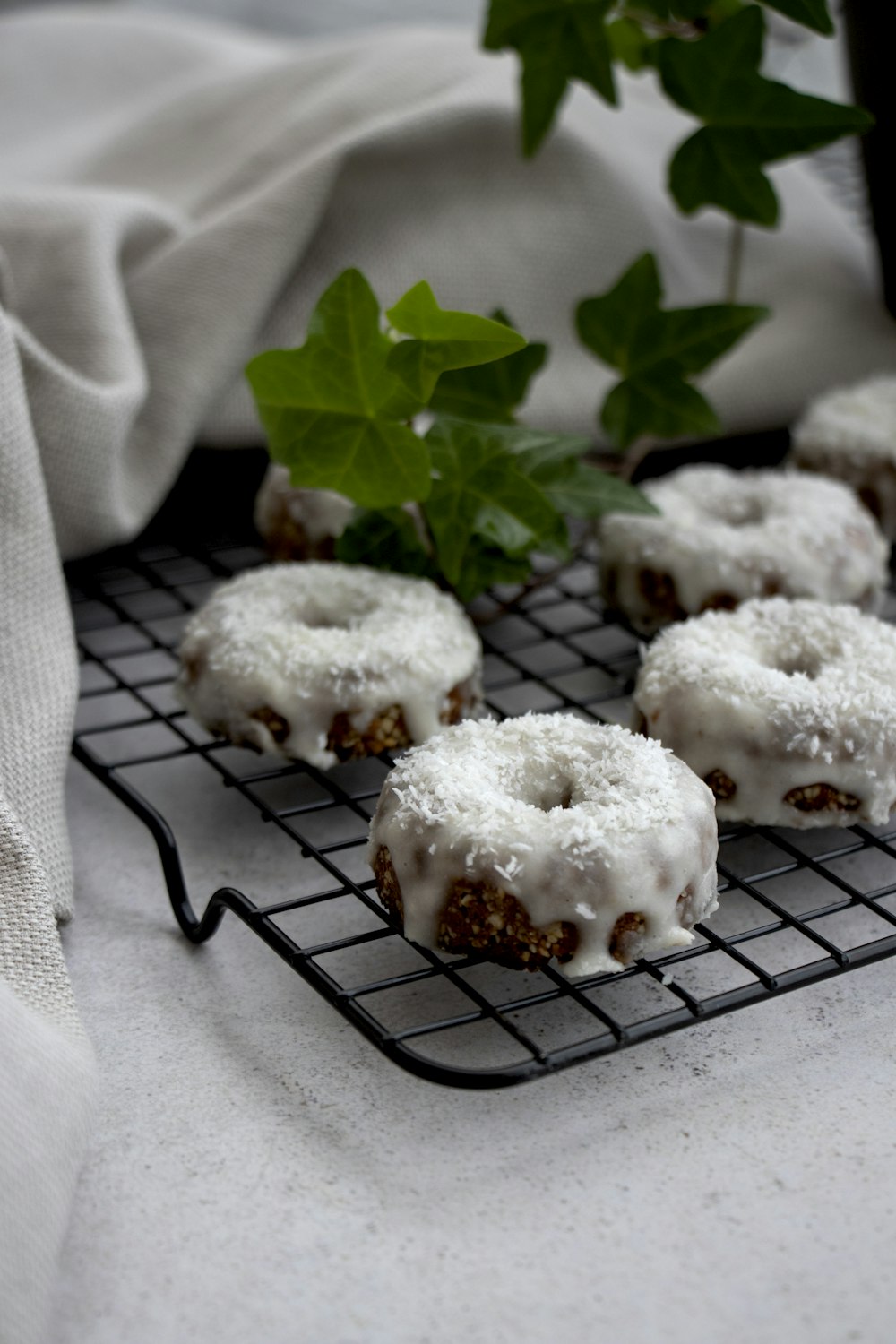 white and brown pastry on black metal frame