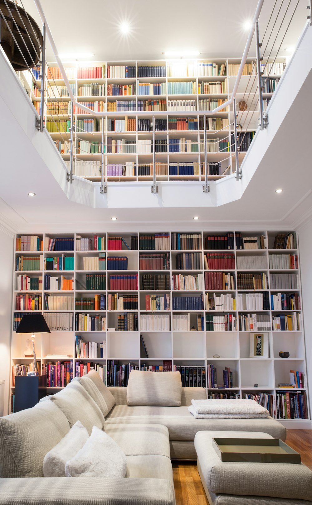 white wooden book shelves with books