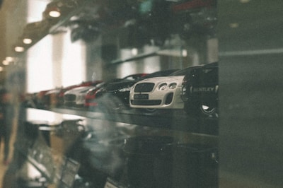 black and white car on road