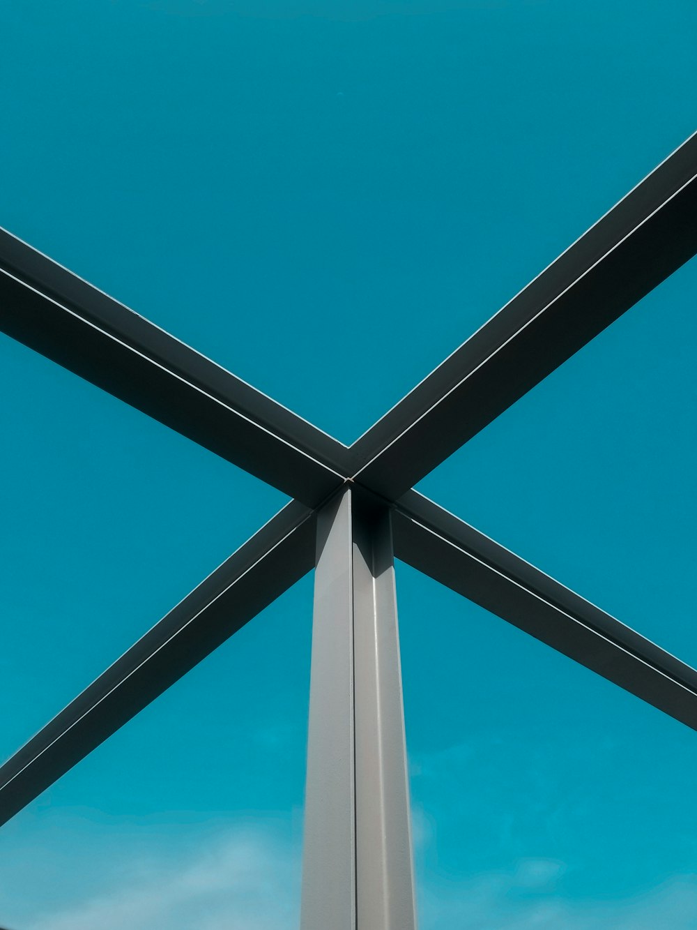 white metal frame under blue sky during daytime