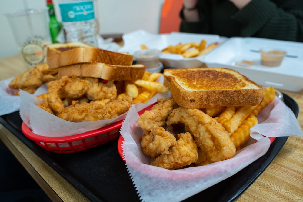 fried food on white and red ceramic plate