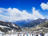 people on snow covered mountain during daytime