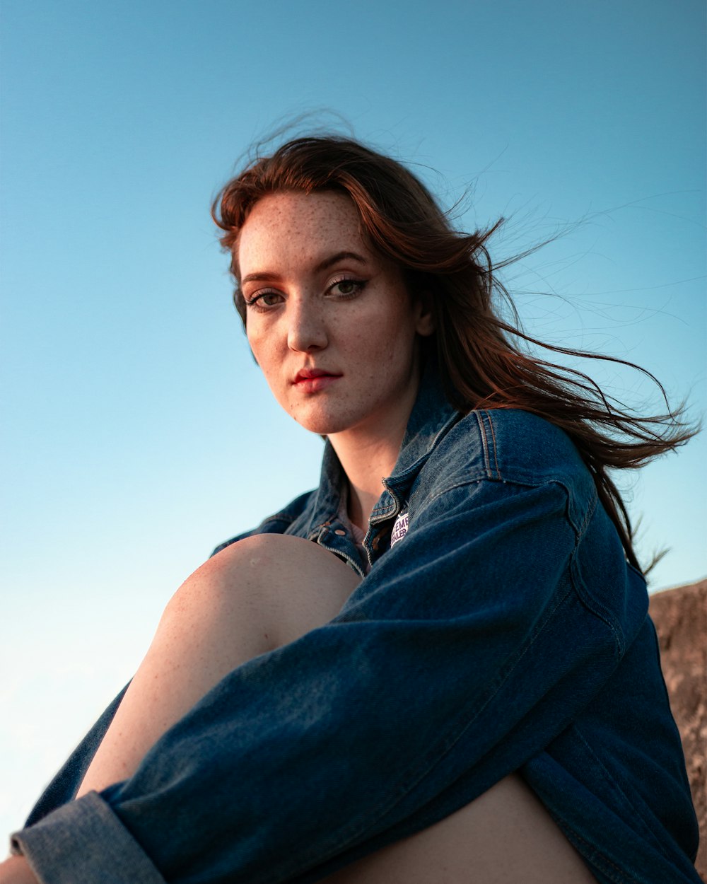 woman in blue denim jacket