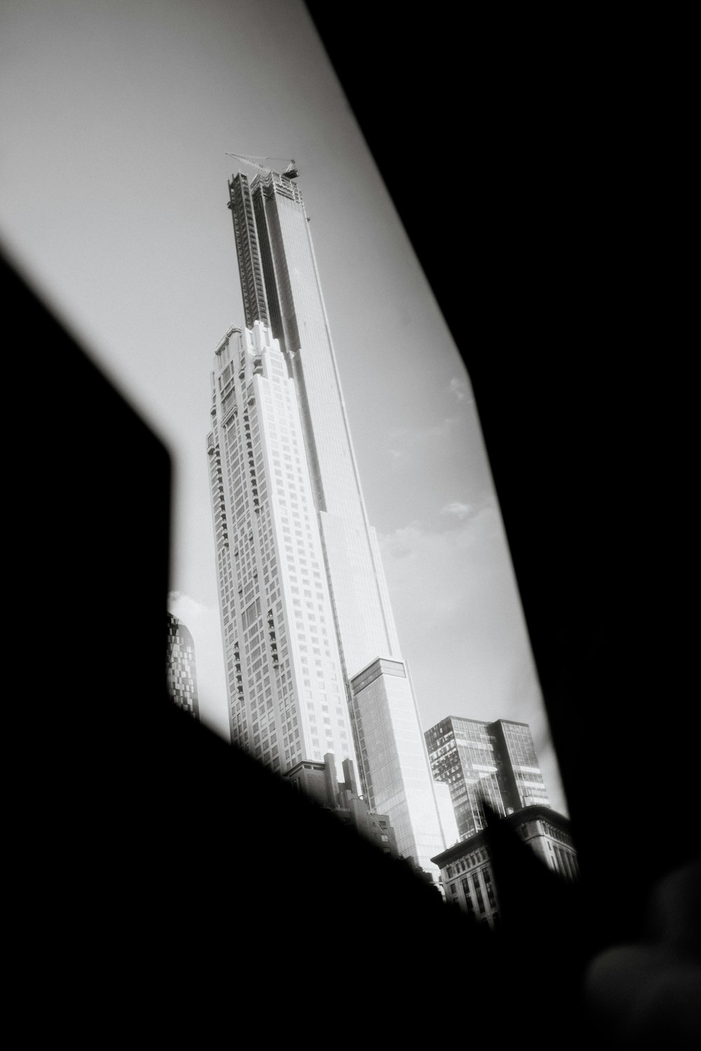 grayscale photo of high rise building