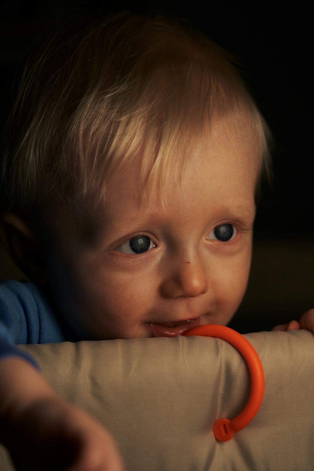 baby in blue long sleeve shirt