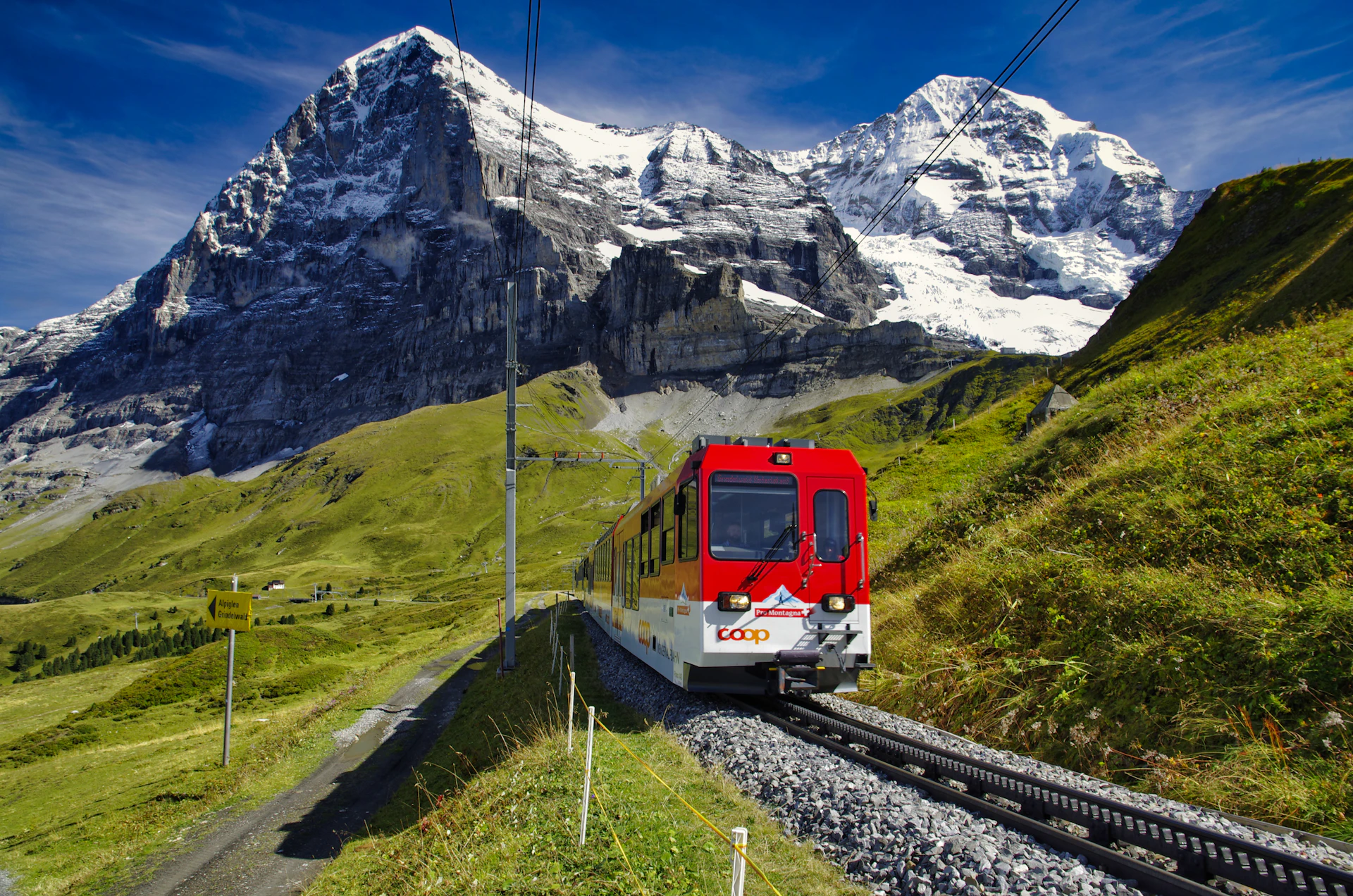 A train working up through the Alpine passes