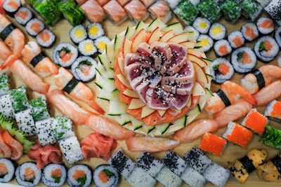 A vibrant sushi platter arranged beautifully with nigiri, sashimi, and rolls, highlighting the variety at Kanade Sushi.
