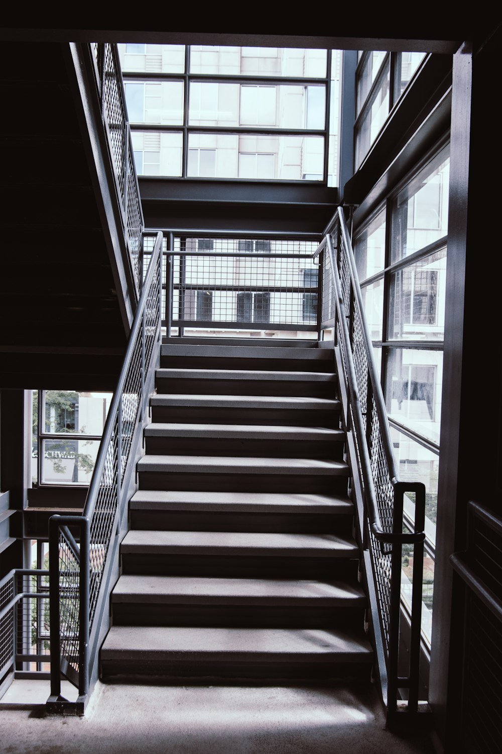 grayscale photo of a staircase