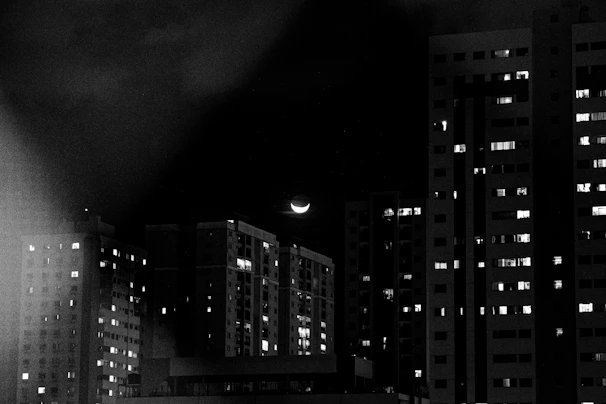 grayscale photo of high rise building