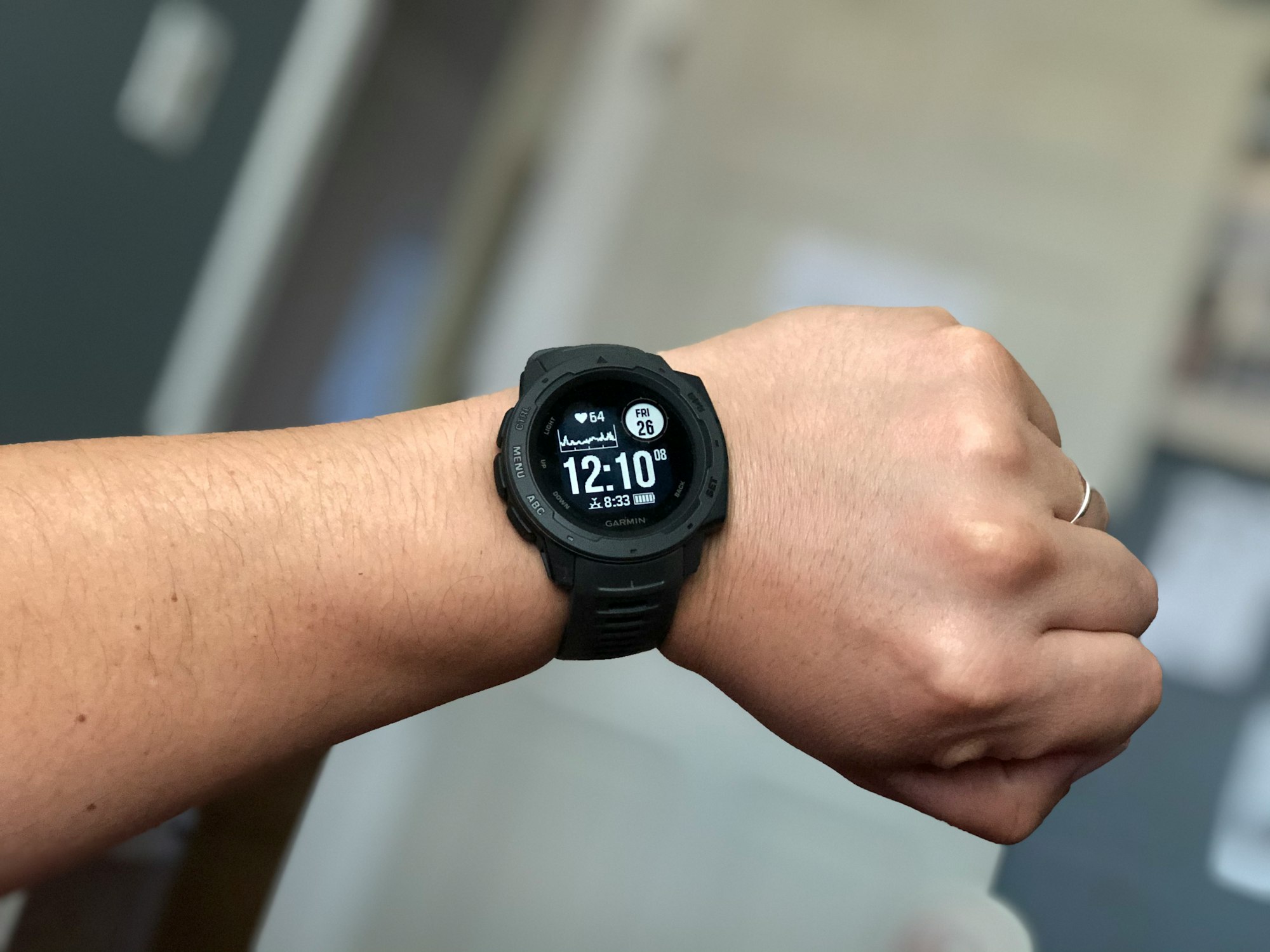 A runner wearing a smart watch
