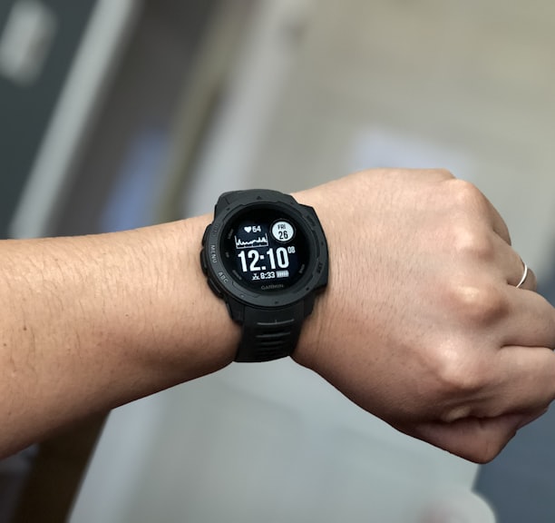 person wearing black digital watch