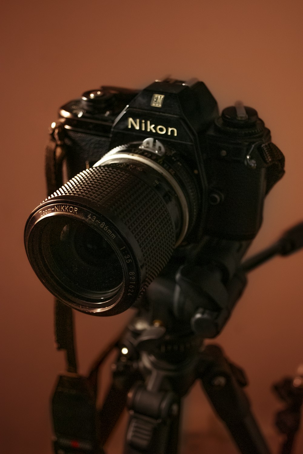 a camera sitting on top of a tripod