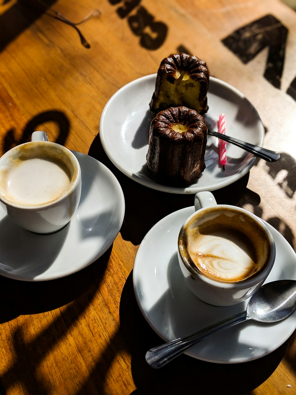 white ceramic cup on white ceramic saucer