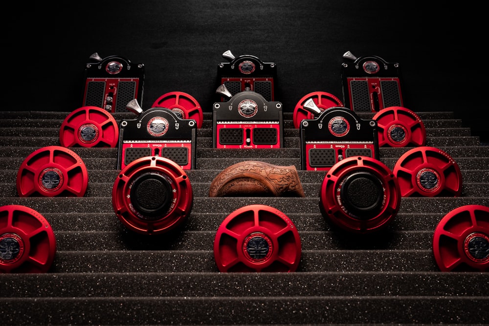 red and black camera on brown wooden table