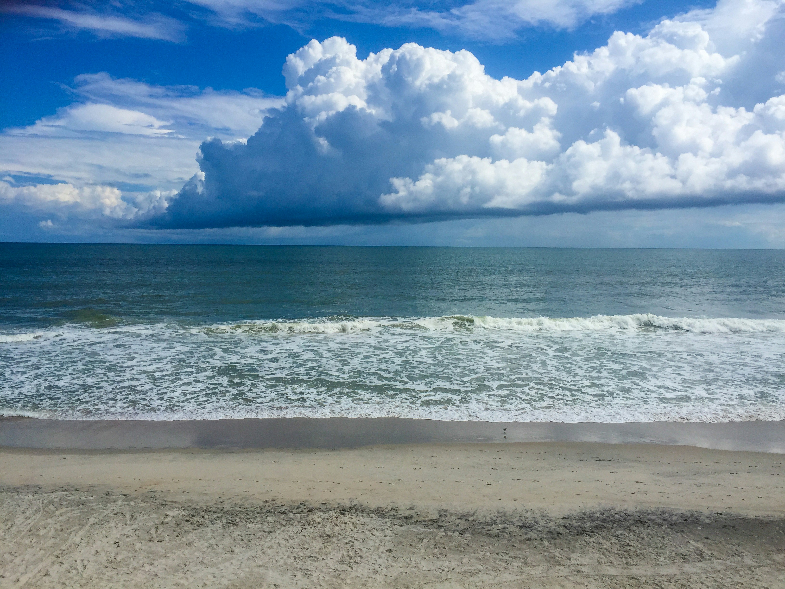 White Clouds Over The Sea Photo Free Ocean Image On Unsplash