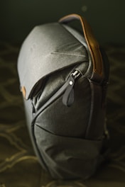 gray and brown leather backpack