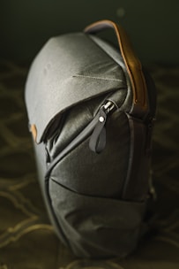 gray and brown leather backpack