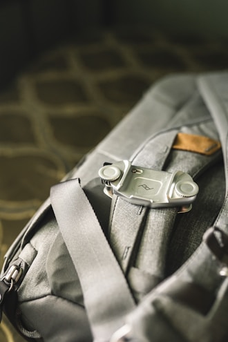 Close-up of a trendy leather backpack with soft pastel tones