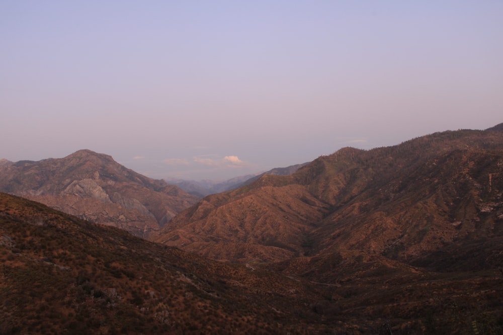 brown mountains under white sky during daytime