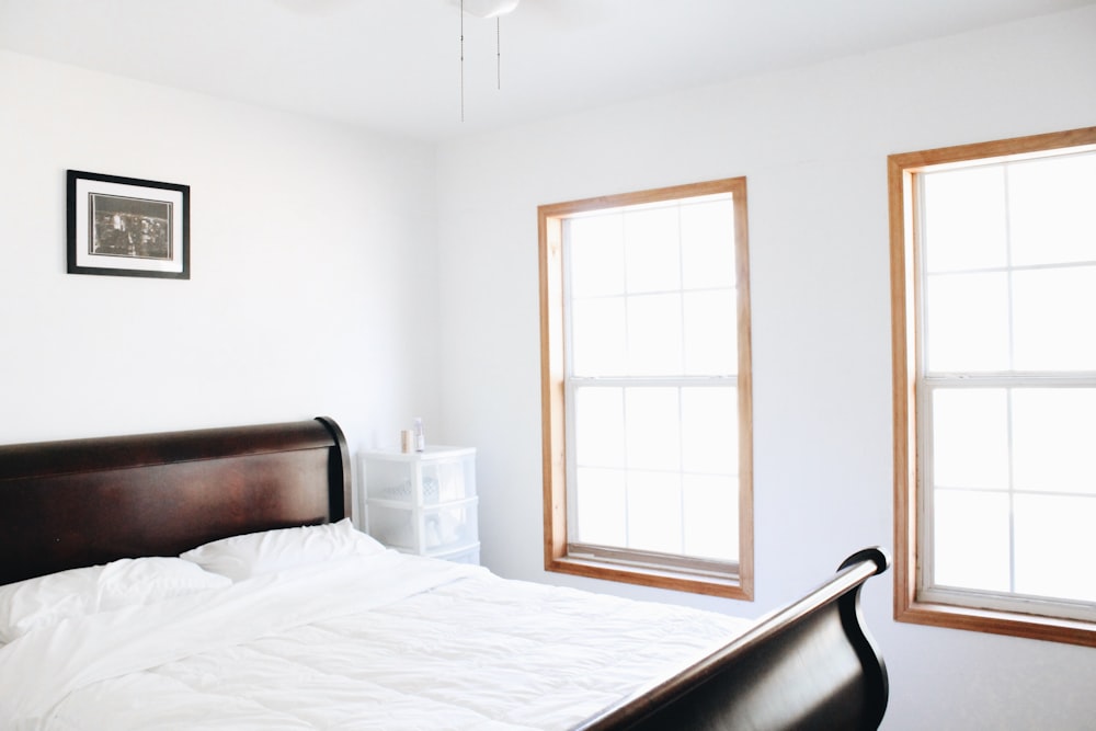 brown wooden framed glass window