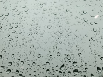 water droplets on clear glass