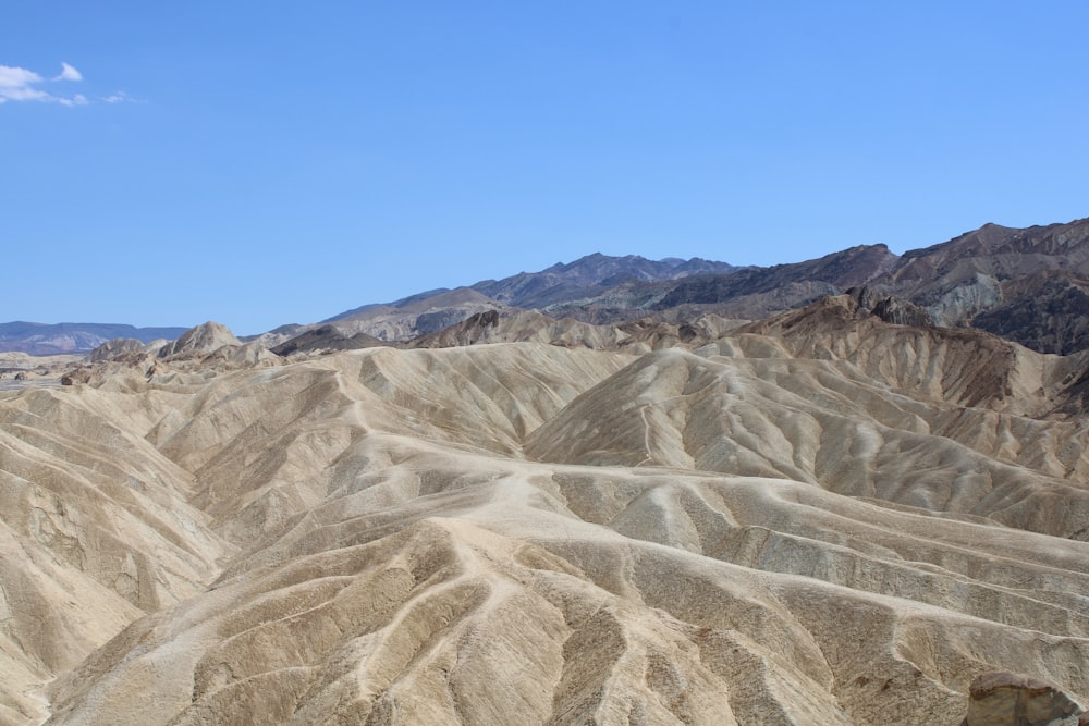 brown rocky mountain under blue sky during daytime