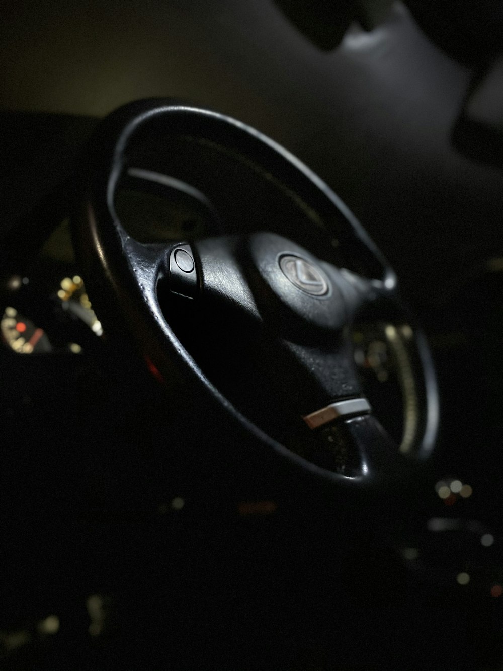 black and silver car steering wheel