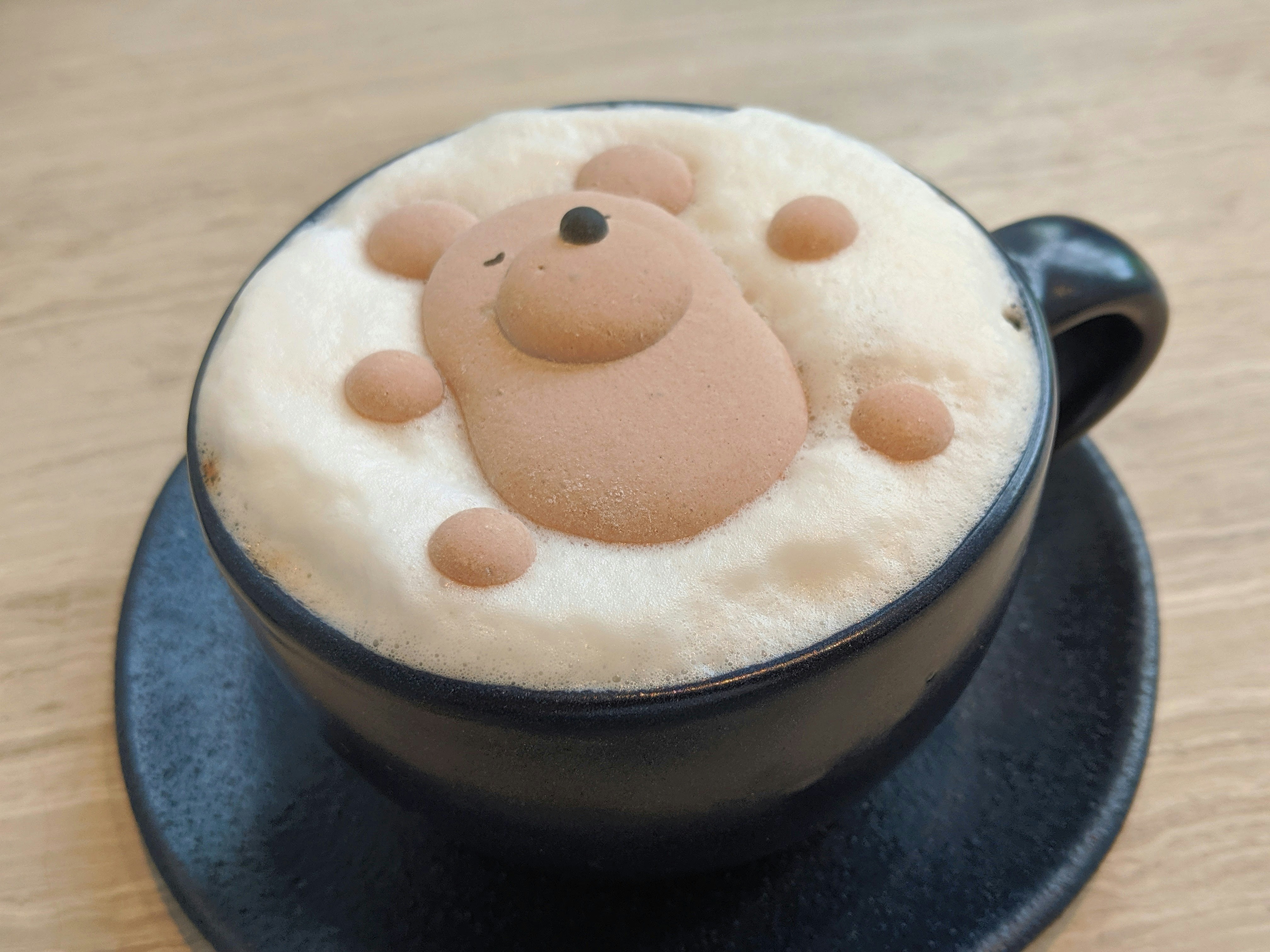 Hot chocolate with a teddy bear foam design