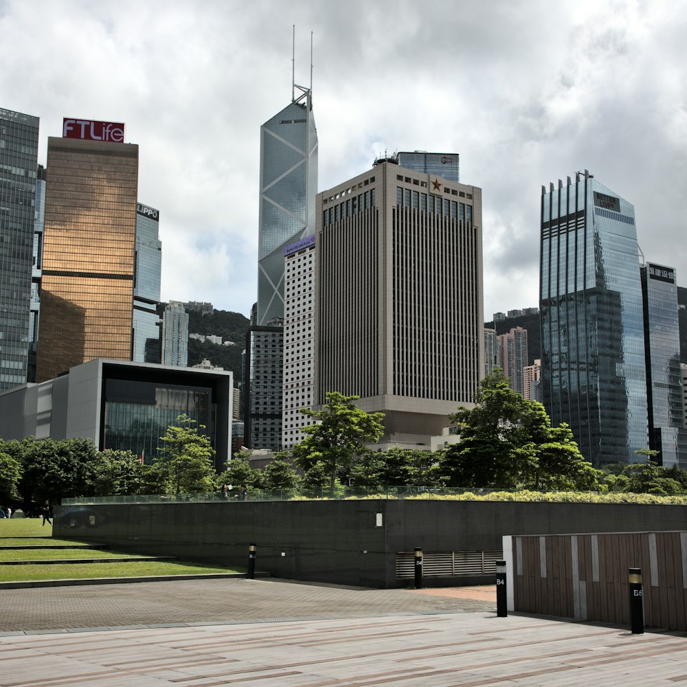 brown and gray concrete building under white clouds during daytime