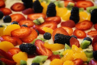 sliced fruits on white ceramic plate