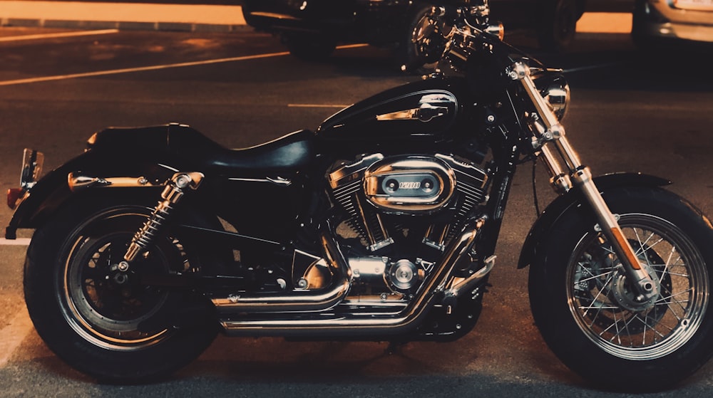 black and silver cruiser motorcycle