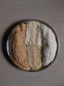 brown powder in round container