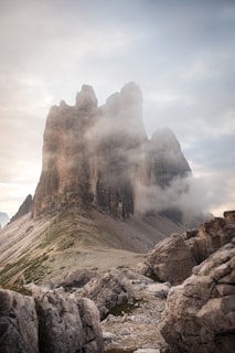 brown rocky mountain under white sky during daytime