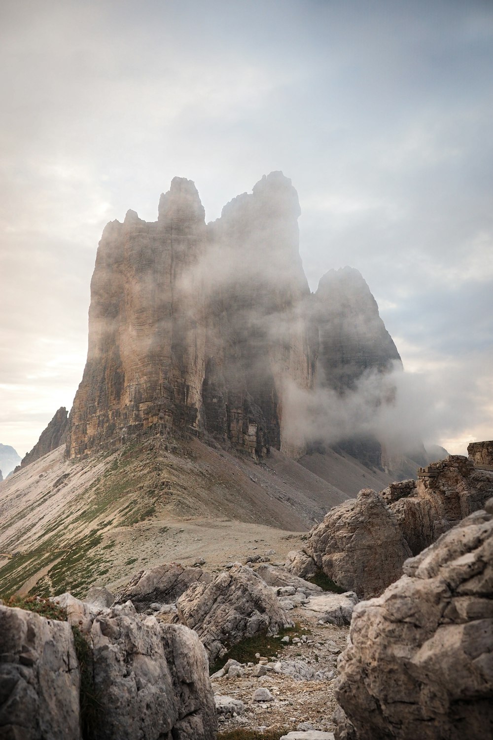 brown rocky mountain under white sky during daytime