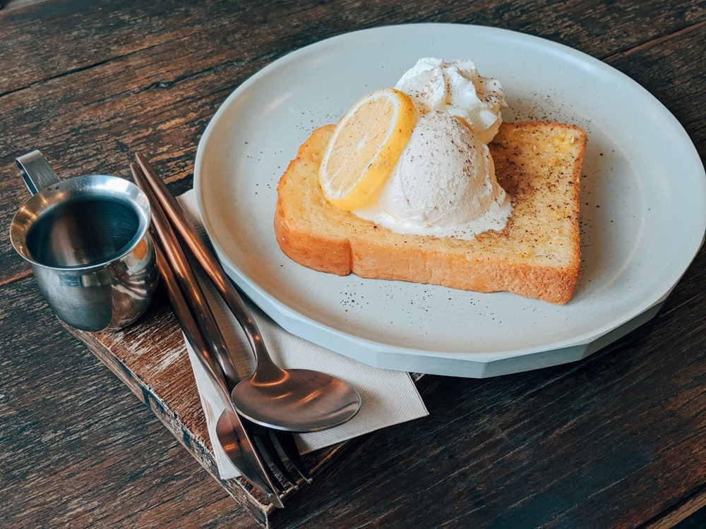 bread on white ceramic plate