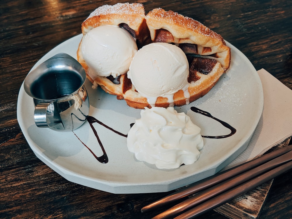 white ice cream on white ceramic plate