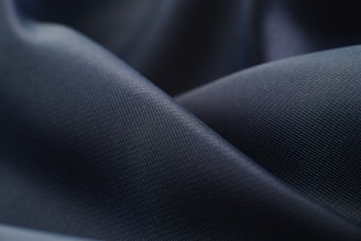 white textile in close up photography