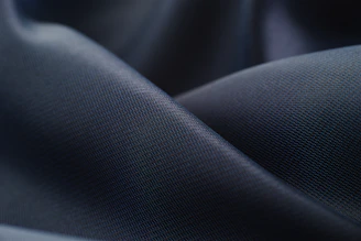white textile in close up photography