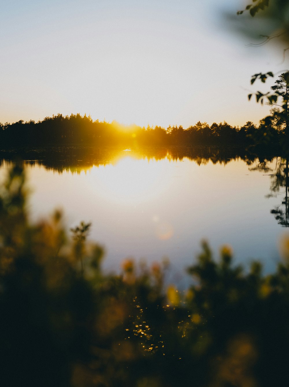 body of water during sunset