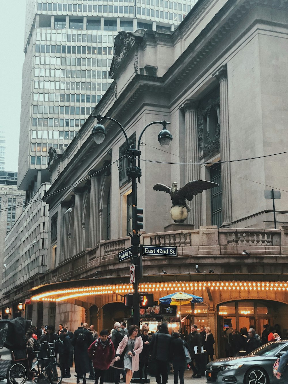 people walking on street near building during daytime