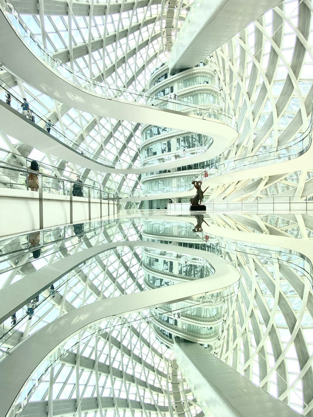 people walking on white concrete building