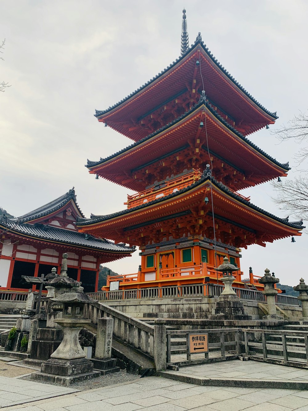 brown and gray temple under white clouds during daytime