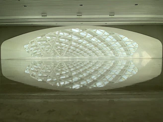 A serene architectural space showcasing balanced symmetry and natural light highlighting structural harmony.