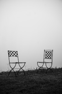 A serene meeting space with two chairs facing each other, symbolizing connection.