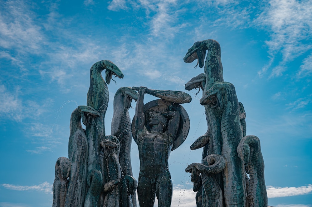 gray statue under blue sky during daytime