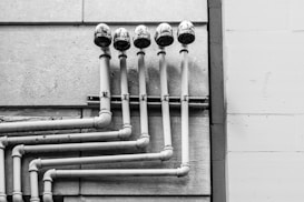 white and black metal pipe
