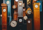 brown wooden framed analog clock