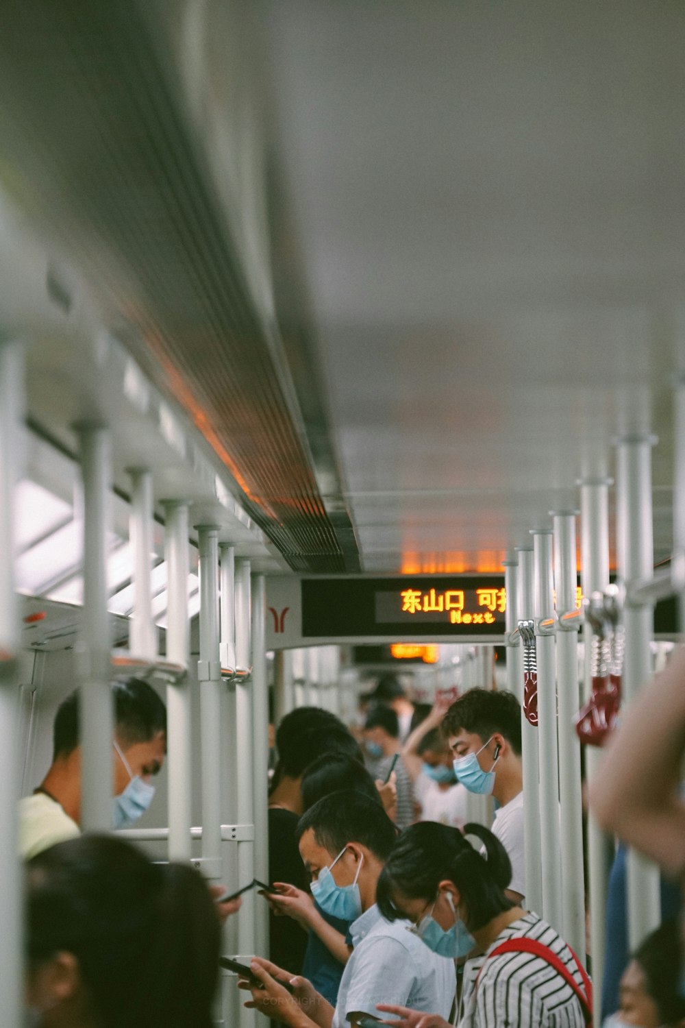 people in train station during daytime