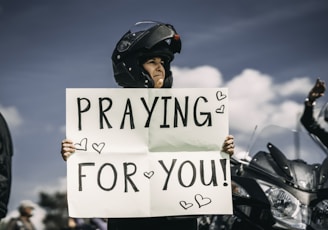 man in black helmet riding motorcycle